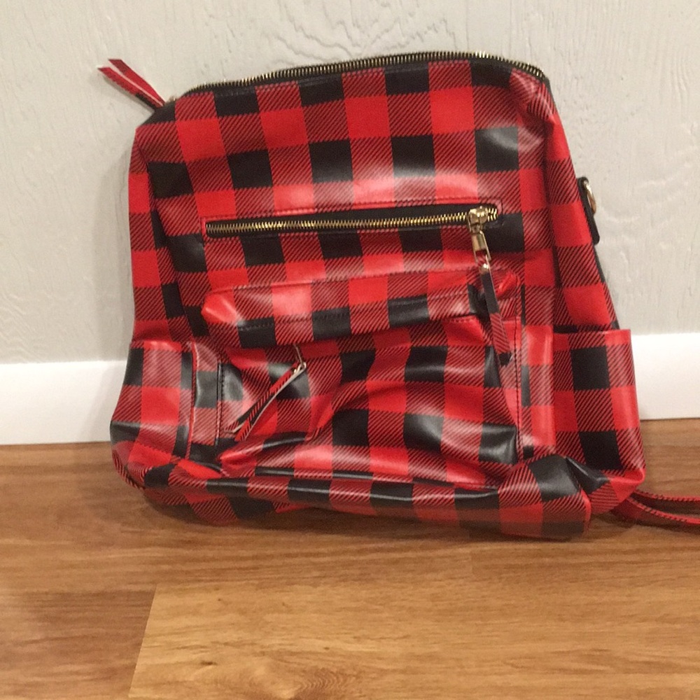 Brand new red and black Buffalo plaid backpack